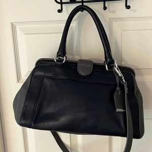 Cole Haan frame satchel handbag in black with grey accent.